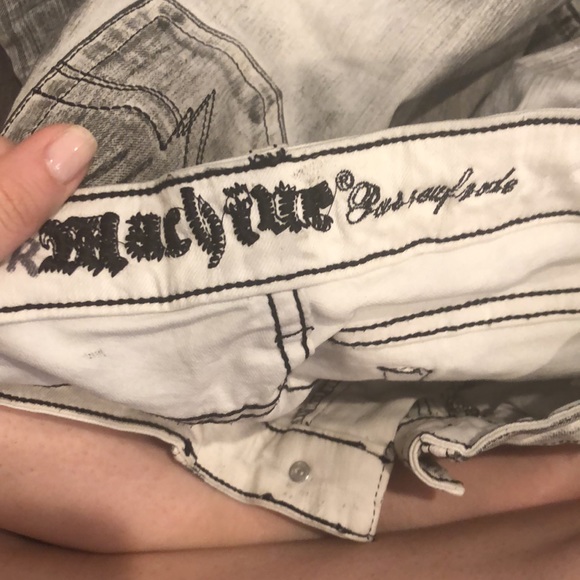 Acid wash jeans with intentional distressing - Picture 6 of 7